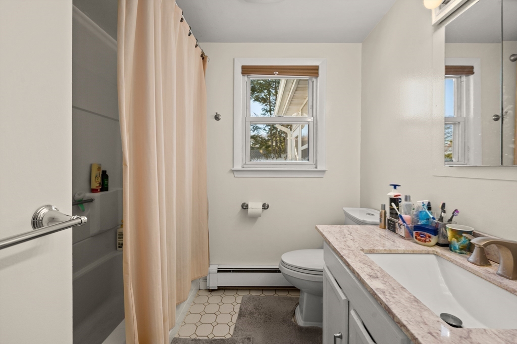 3 Athens Drive Saugus, MA 01906 - Photo 17 of 33 a bathroom with a sink toilet and shower