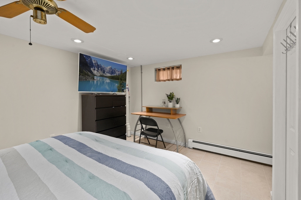 3 Athens Drive Saugus, MA 01906 - Photo 20 of 33 a bedroom with a bed and a dresser