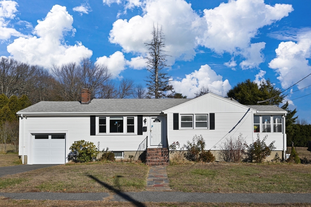 3 Athens Drive Saugus, MA 01906 - Photo 29 of 33 a front view of a house with garden