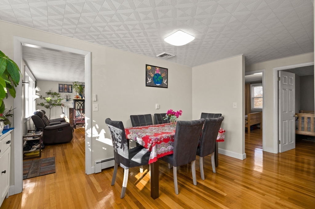 3 Athens Drive Saugus, MA 01906 - Photo 6 of 33 a view of a dining room with furniture and wooden floor