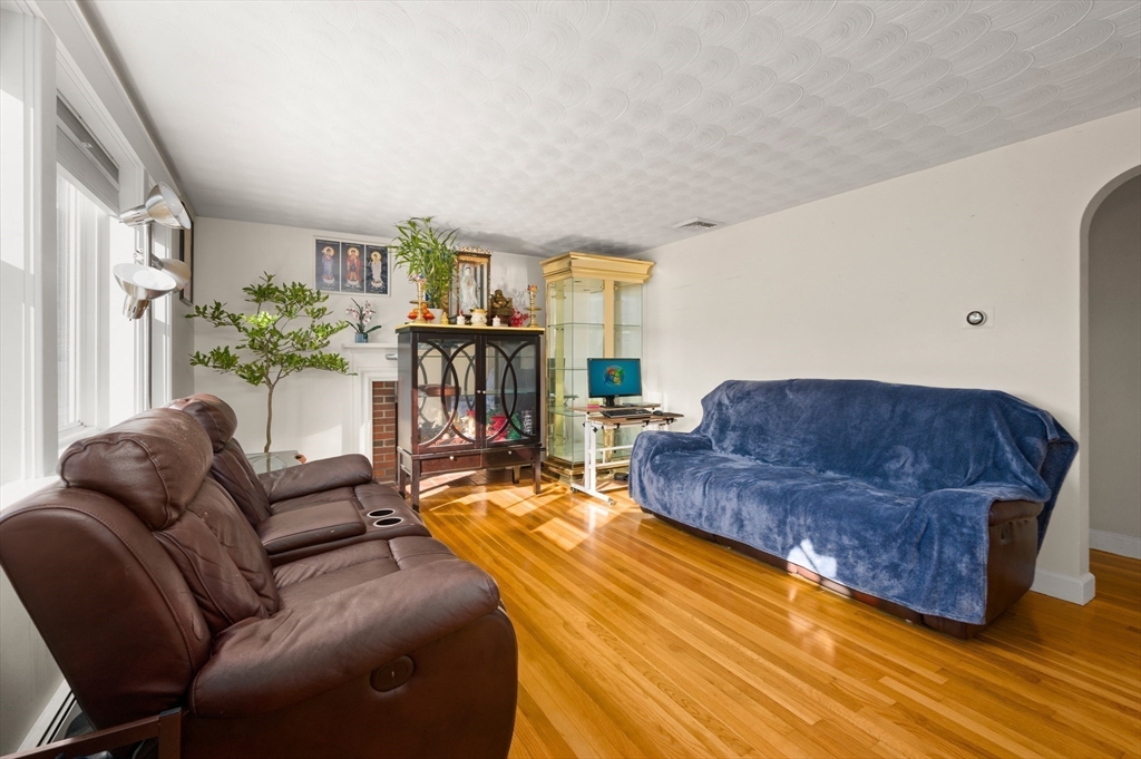 3 Athens Drive Saugus, MA 01906 - Photo 7 of 33 a living room with furniture and a large window