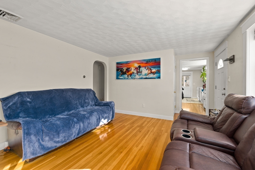 3 Athens Drive Saugus, MA 01906 - Photo 10 of 33 a living room with furniture and a couch