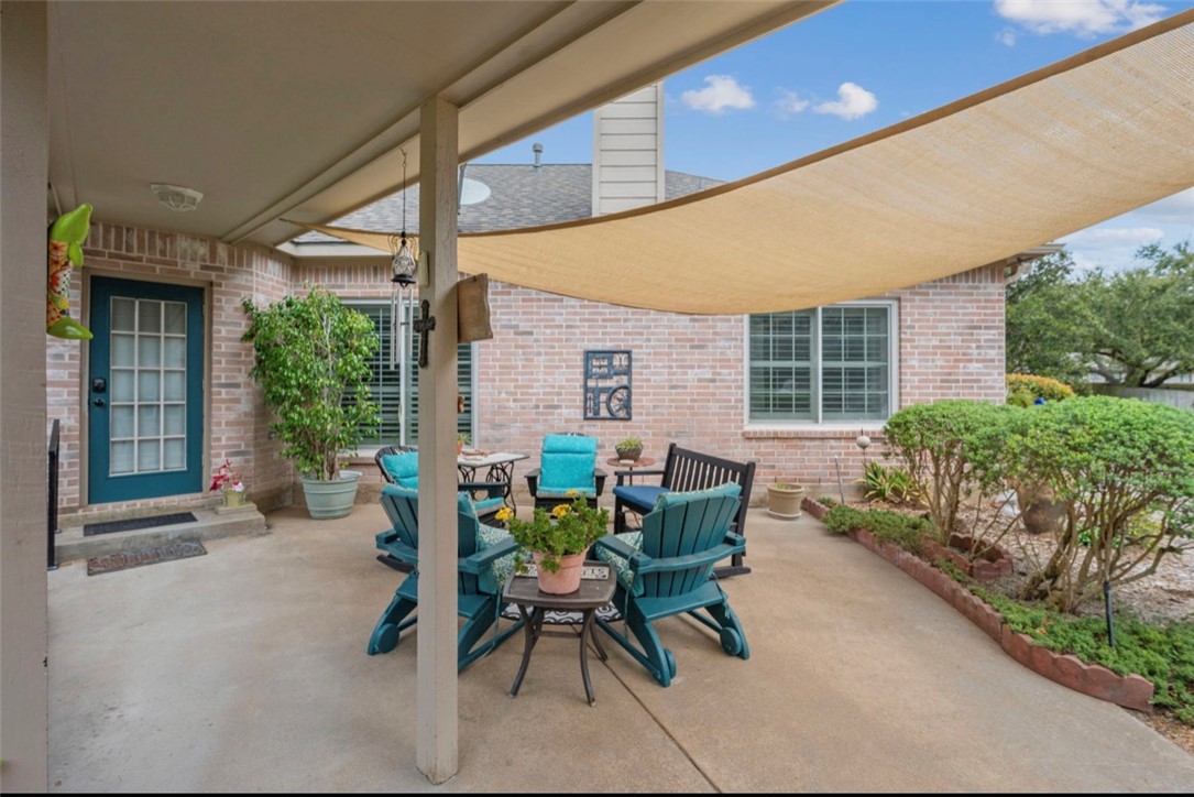 1400 Gun And Rod Road Brenham, TX 77833 - Photo 18 of 23 a view of a patio with table and chairs and potted plants