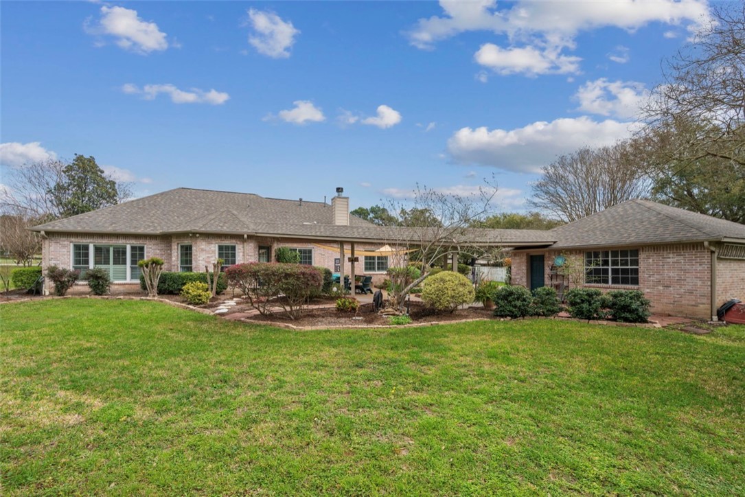 1400 Gun And Rod Road Brenham, TX 77833 - Photo 19 of 23 a front view of a house with garden
