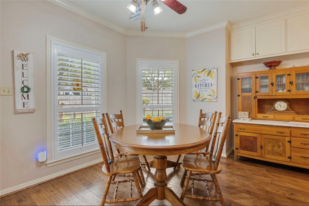 1400 Gun And Rod Road Brenham, TX 77833 - Photo 5 of 23 a dining room with furniture and wooden floor