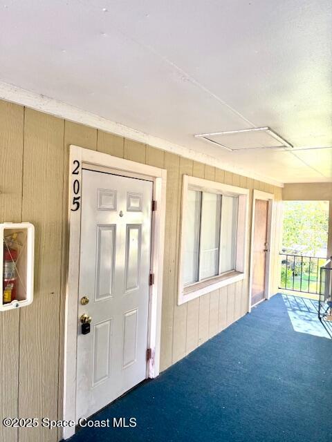 4304 London Town Road, Unit B205 Titusville, FL 32796 - Photo 2 of 8 wooden floor in an empty room with a window