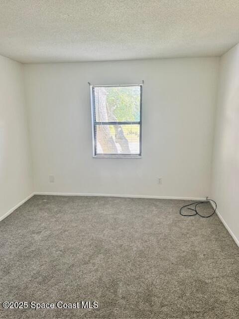4304 London Town Road, Unit B205 Titusville, FL 32796 - Photo 7 of 8 an empty room with a window