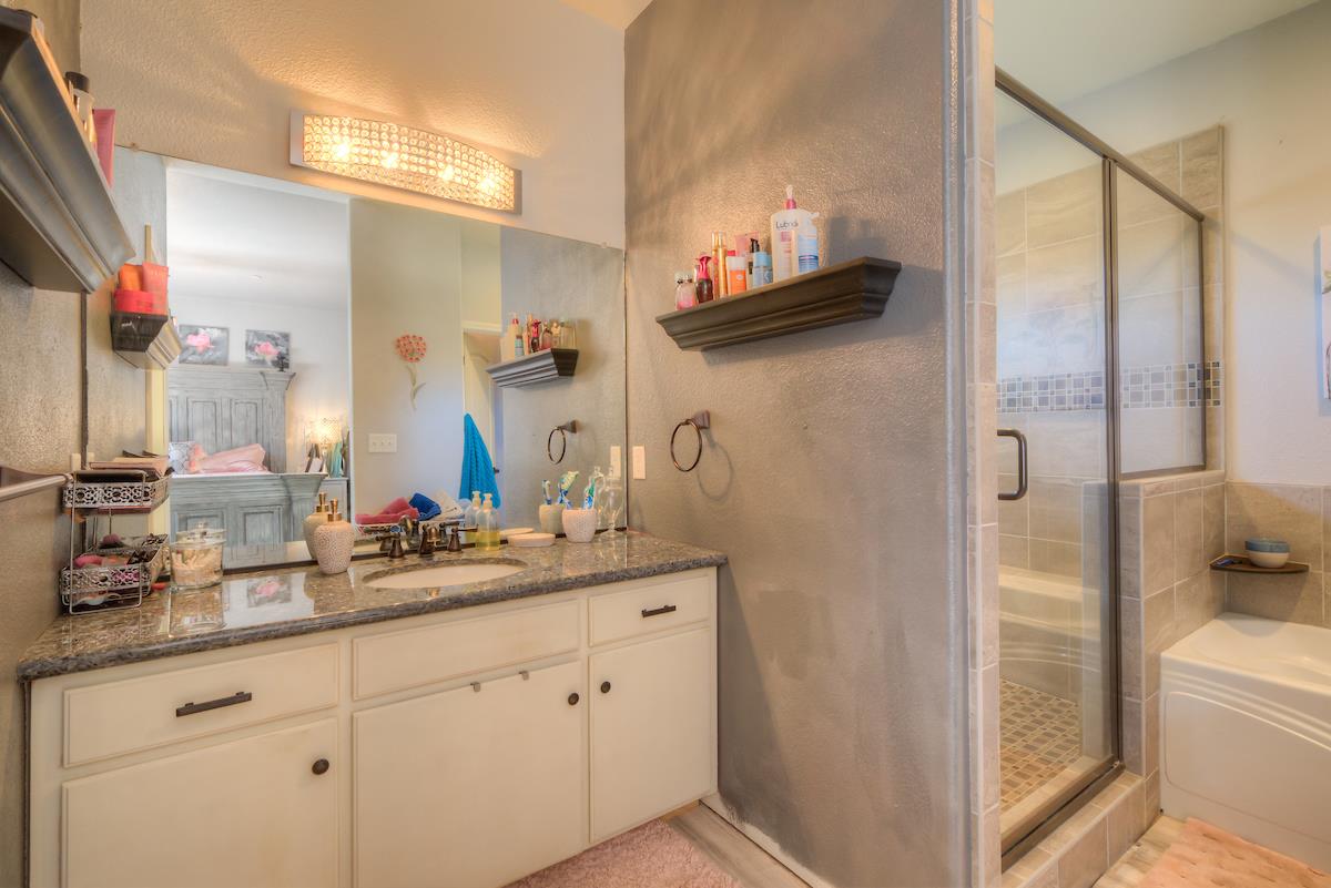 83 Northfork Road Berry Creek, CA 95916 - Photo 40 of 56 a bathroom with a sink and a mirror