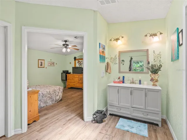 a bathroom with a shower and a curtain