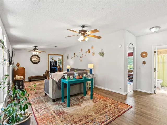 a living room with furniture and a table