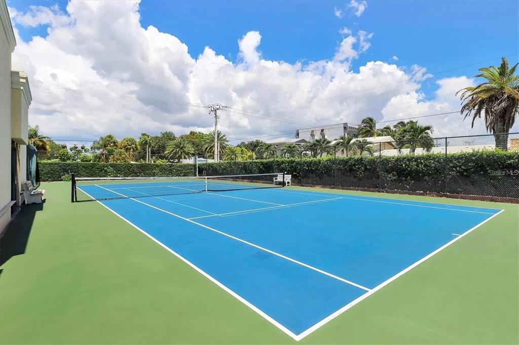 6006 Midnight Pass Road, Unit 36 Sarasota, FL 34242 - Photo 35 of 43 a view of a tennis court