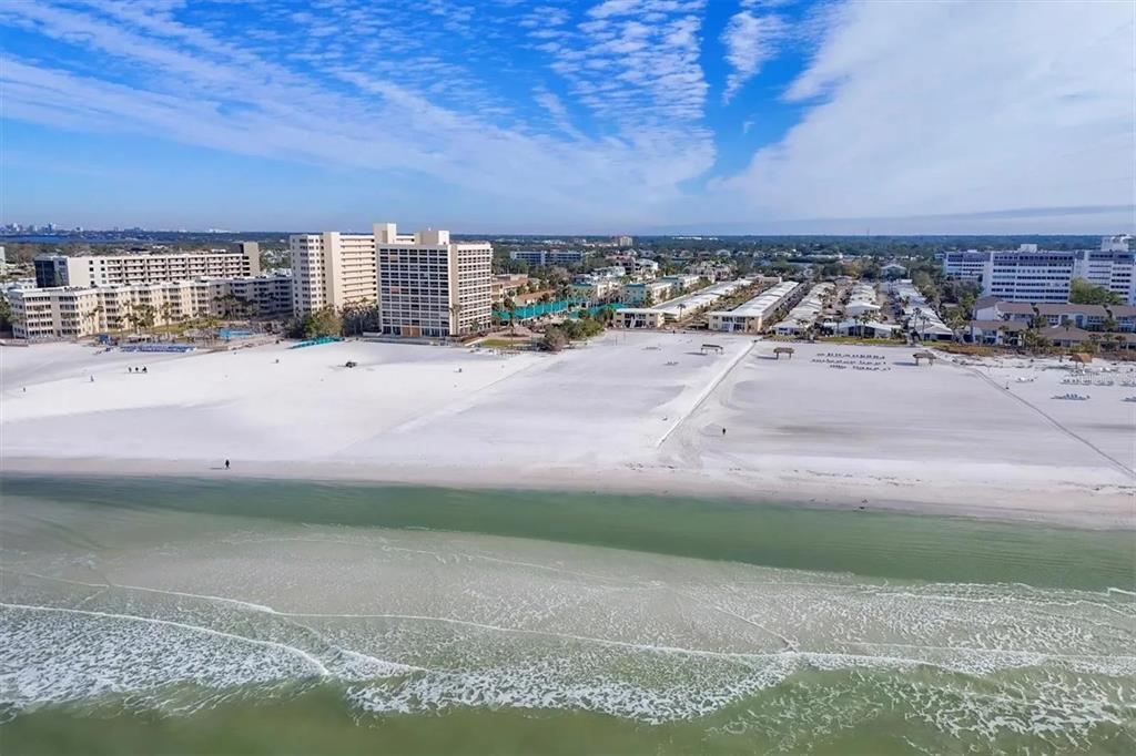 6006 Midnight Pass Road, Unit 36 Sarasota, FL 34242 - Photo 42 of 43 a view of parking space with city view