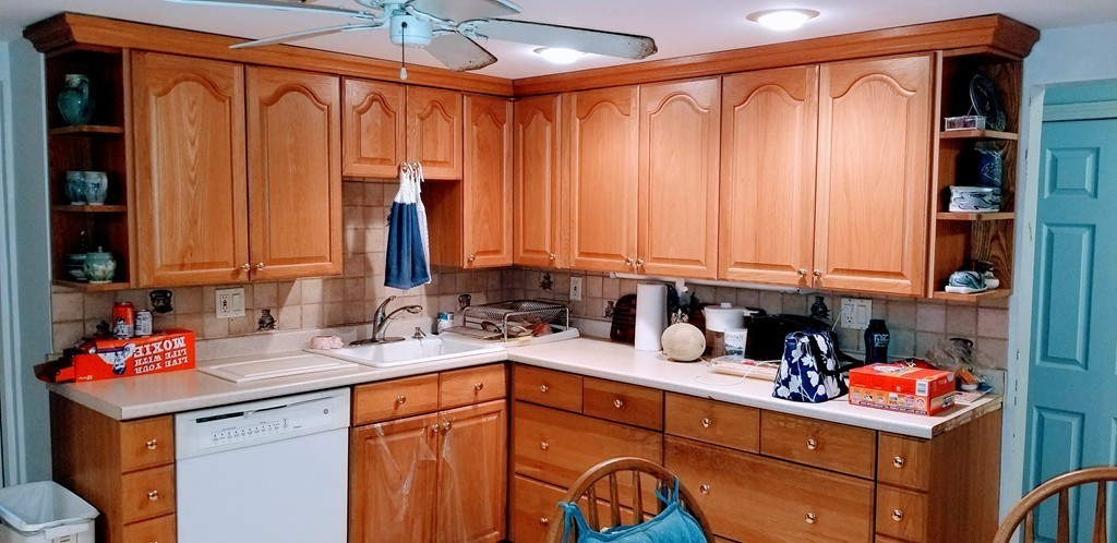 58 Dearborn Street Medford, MA 02155 - Photo 13 of 30 a kitchen with stainless steel appliances granite countertop a sink and cabinets