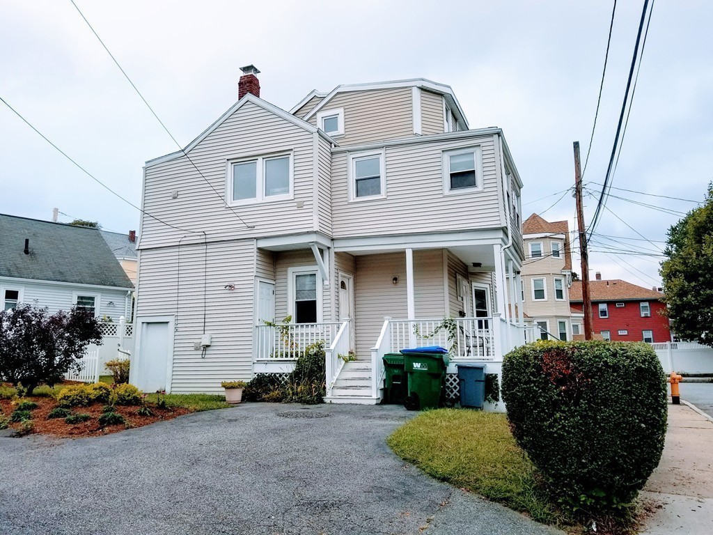 58 Dearborn Street Medford, MA 02155 - Photo 30 of 30 a front view of a house with garden