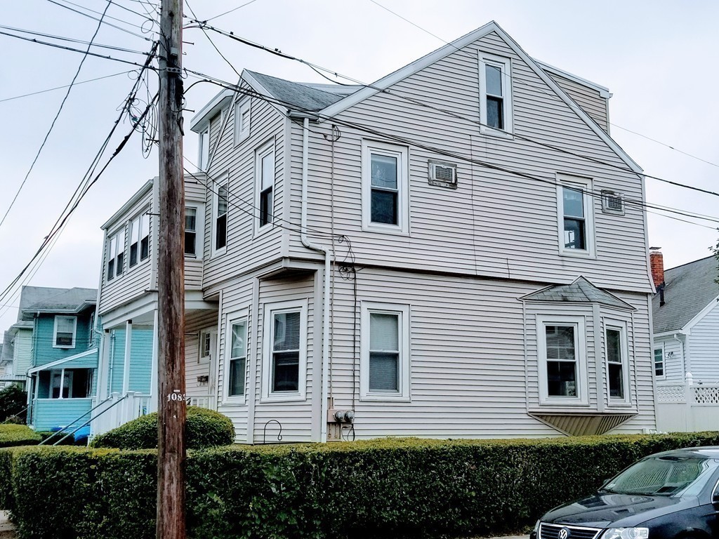 58 Dearborn Street Medford, MA 02155 - Photo 7 of 30 a front view of a house with a yard