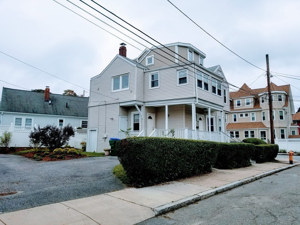 58 Dearborn Street Medford, MA 02155 - Photo 9 of 30 a front view of a building with many windows