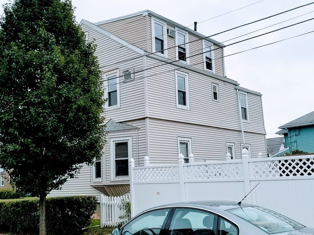 58 Dearborn Street Medford, MA 02155 - Photo 10 of 30 a front view of a house with a tree