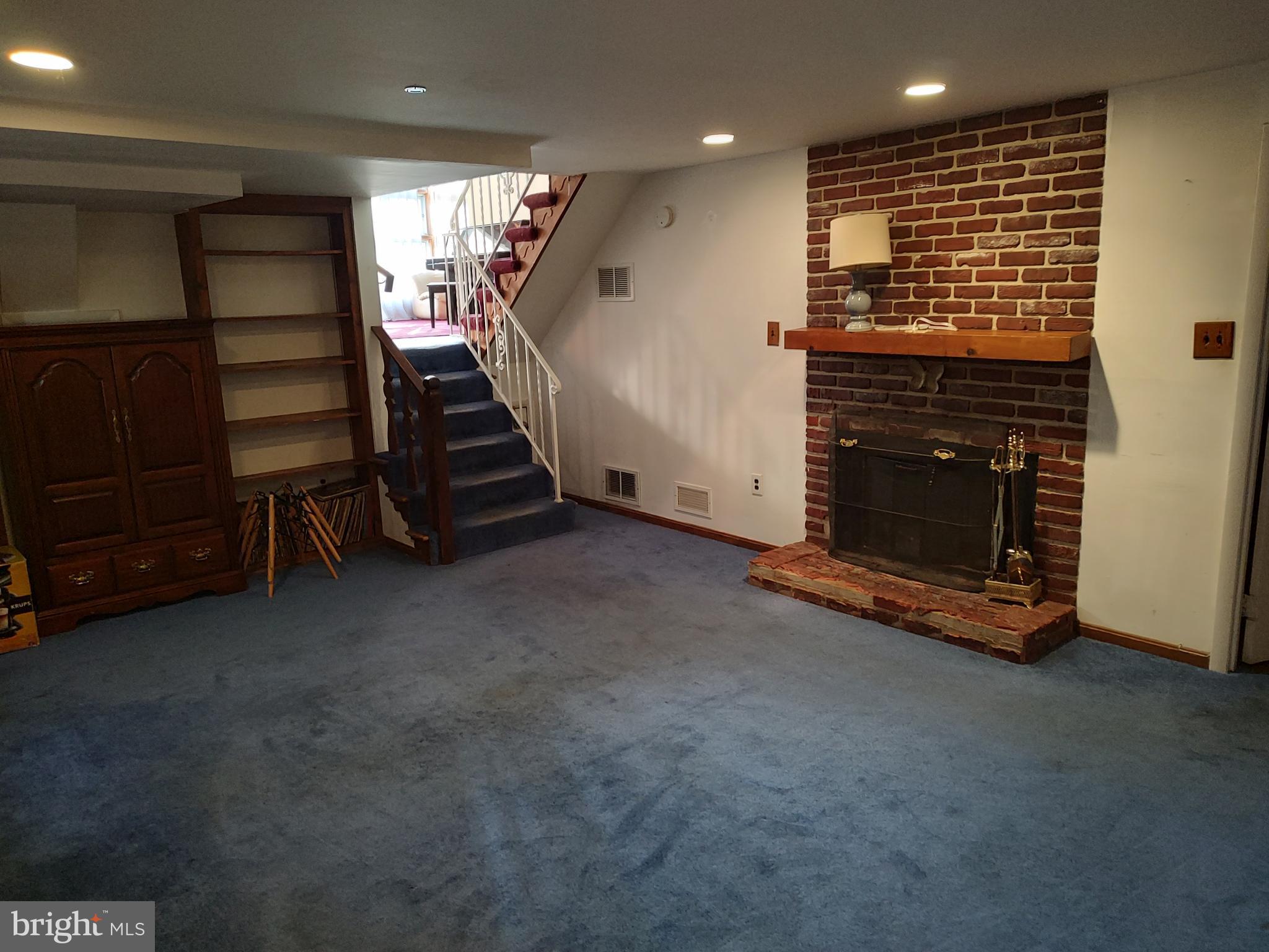 603 Perth Place Silver Spring, MD 20901 - Photo 2 of 16 a view of an empty room with a fireplace