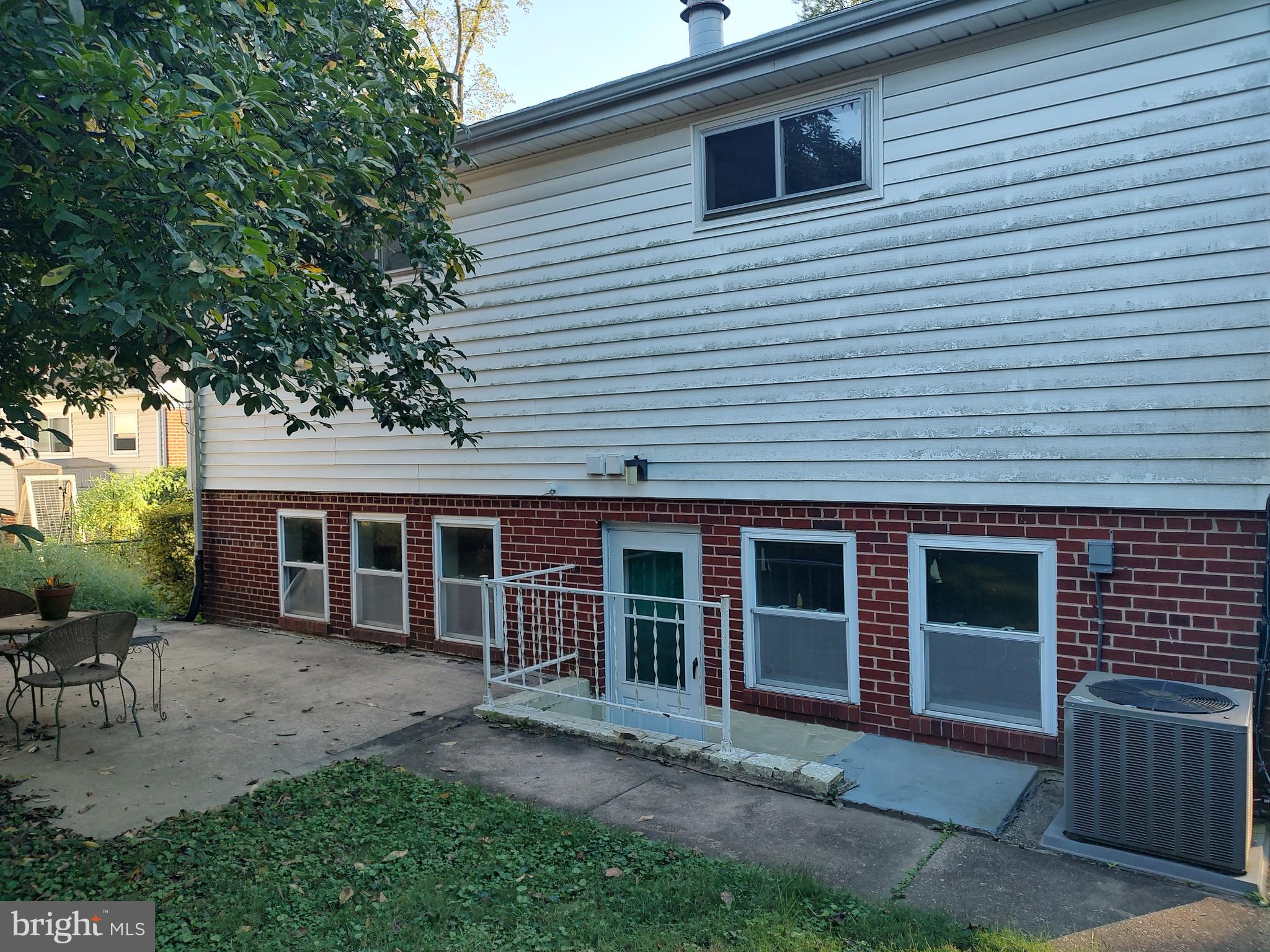 603 Perth Place Silver Spring, MD 20901 - Photo 5 of 16 a view of a house with a yard and sitting area