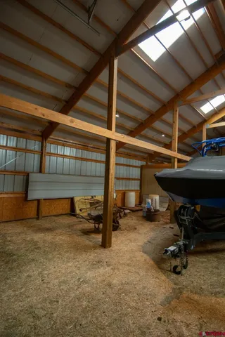 a view of house with garage