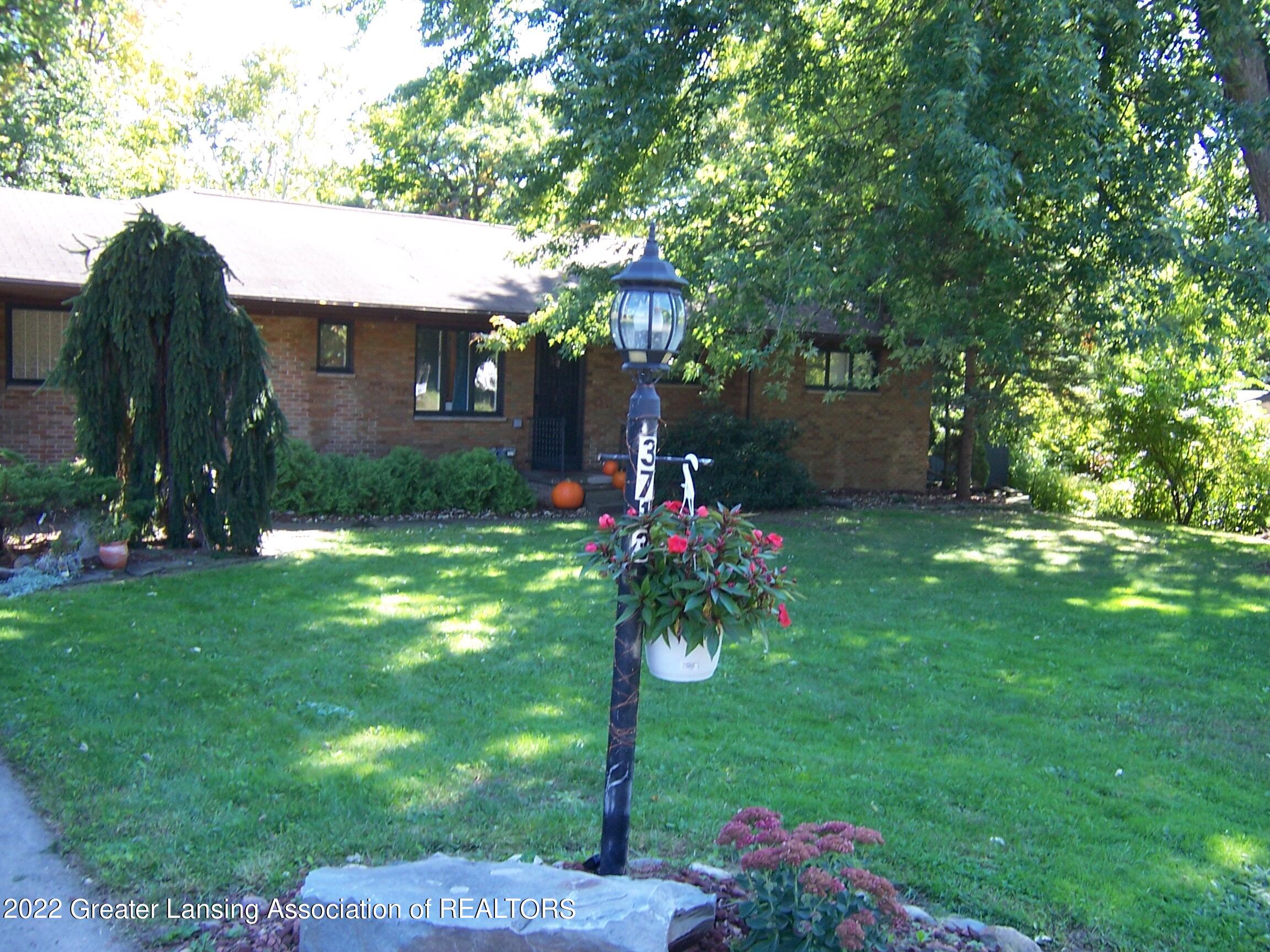 3713 Tecumseh River Road Lansing, MI 48906 - Photo 1 of 44 100_4238