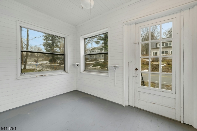 173 Runnymede Road West Caldwell, NJ 07006 - Photo 14 of 27 an empty room with windows