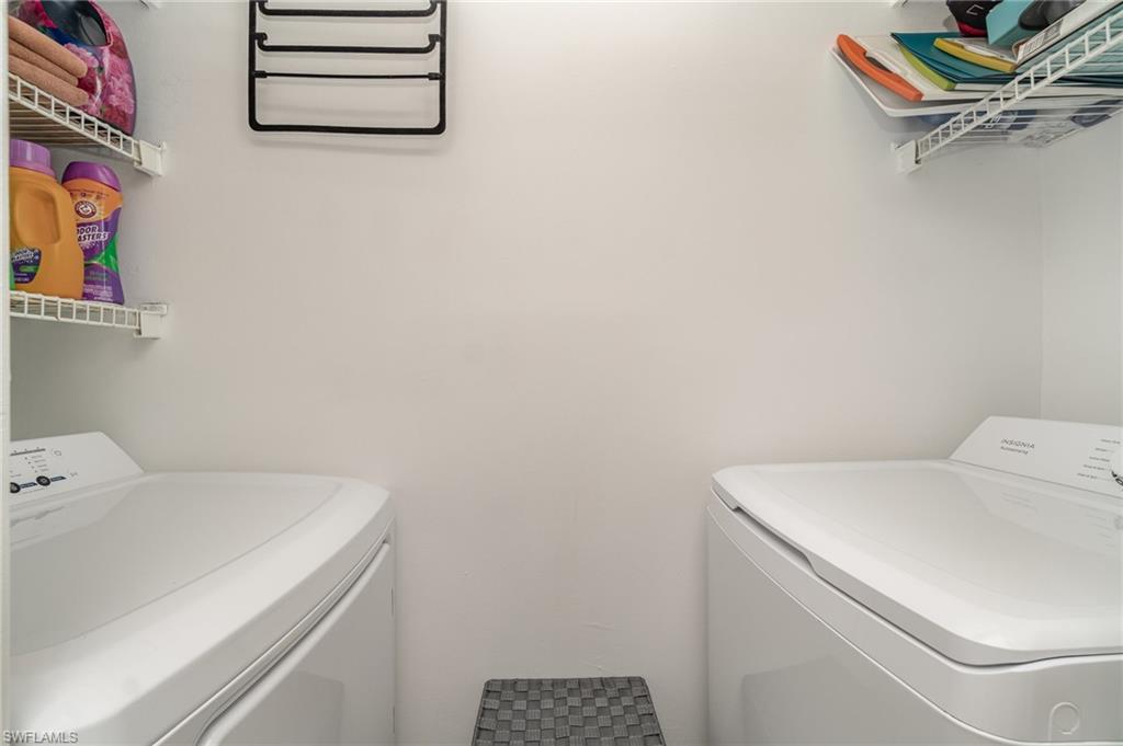 25806 Cockleshell Drive, Unit 115 Bonita Springs, FL 34135 - Photo 18 of 25 a utility room with dryer and washer