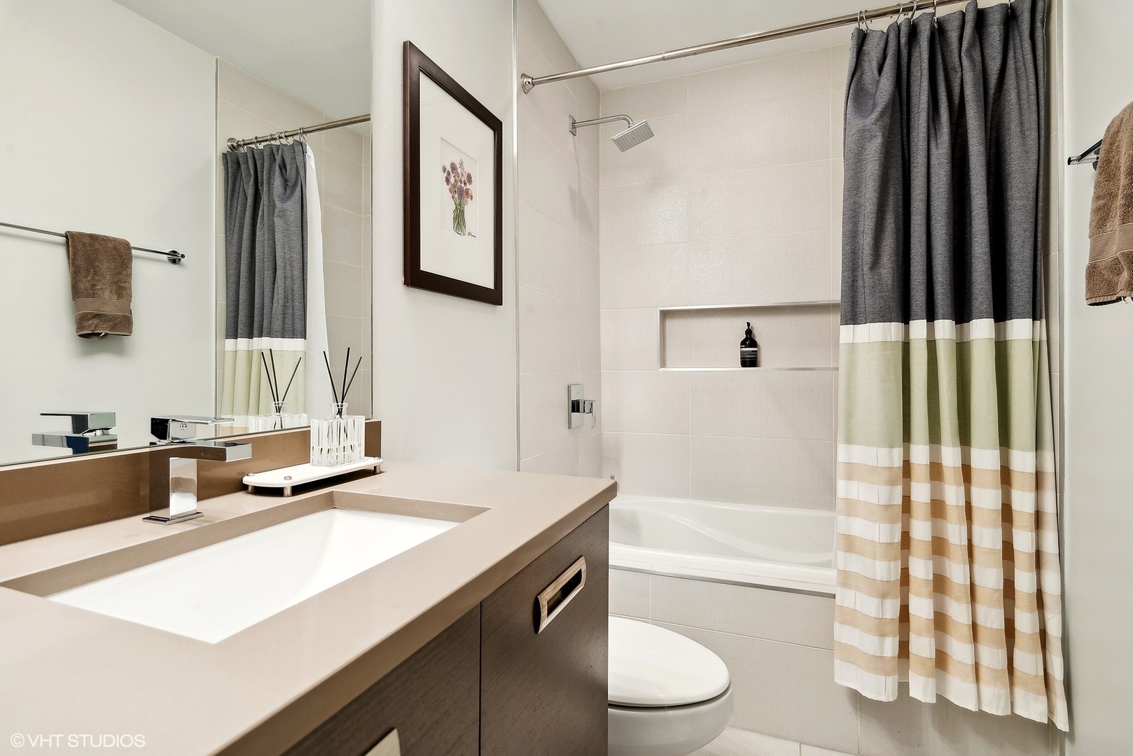 2136 West North Avenue, Unit 2E Chicago, IL 60647 - Photo 12 of 22 a bathroom with a granite countertop sink toilet and shower