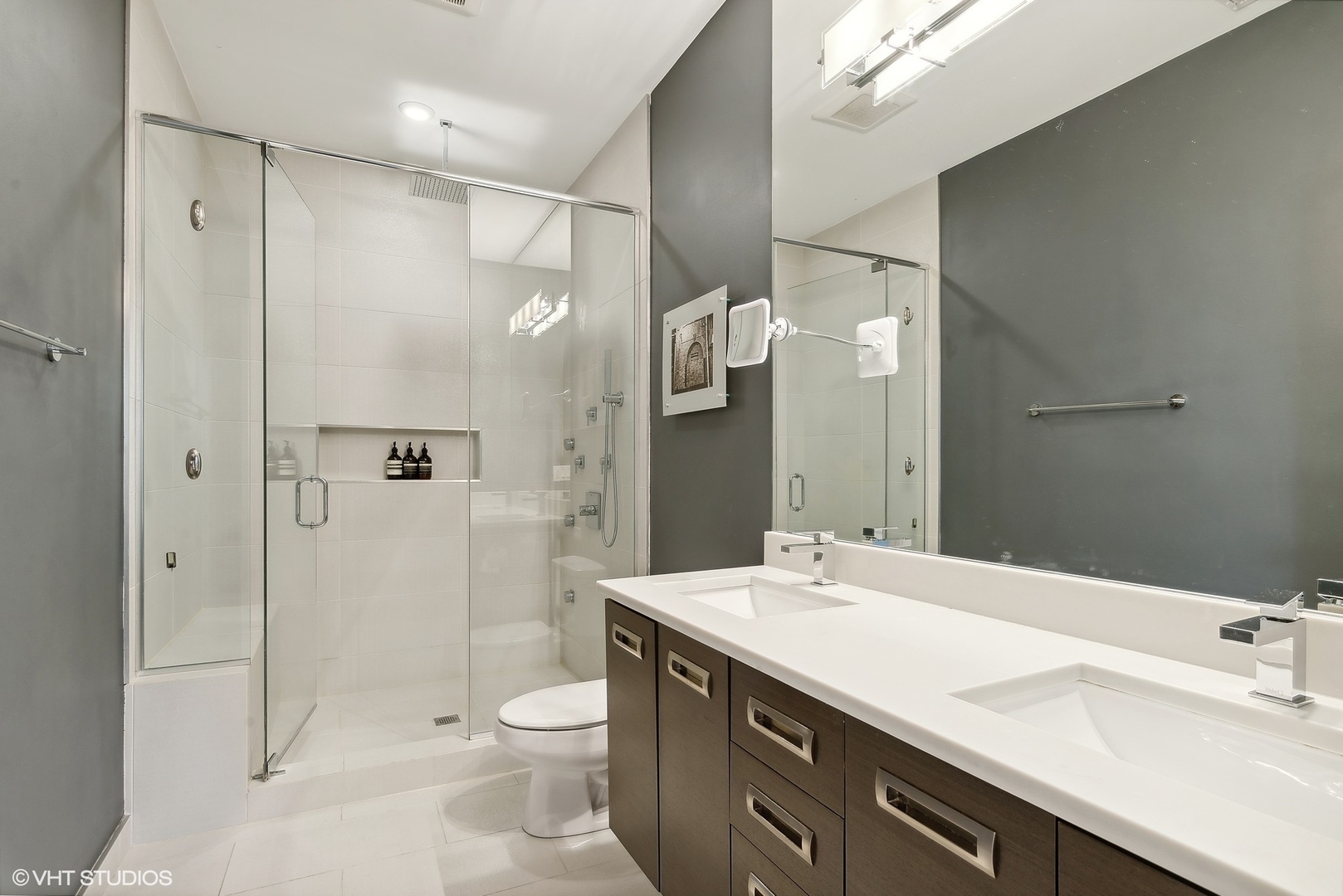 2136 West North Avenue, Unit 2E Chicago, IL 60647 - Photo 17 of 22 a bathroom with a double vanity sink toilet and shower