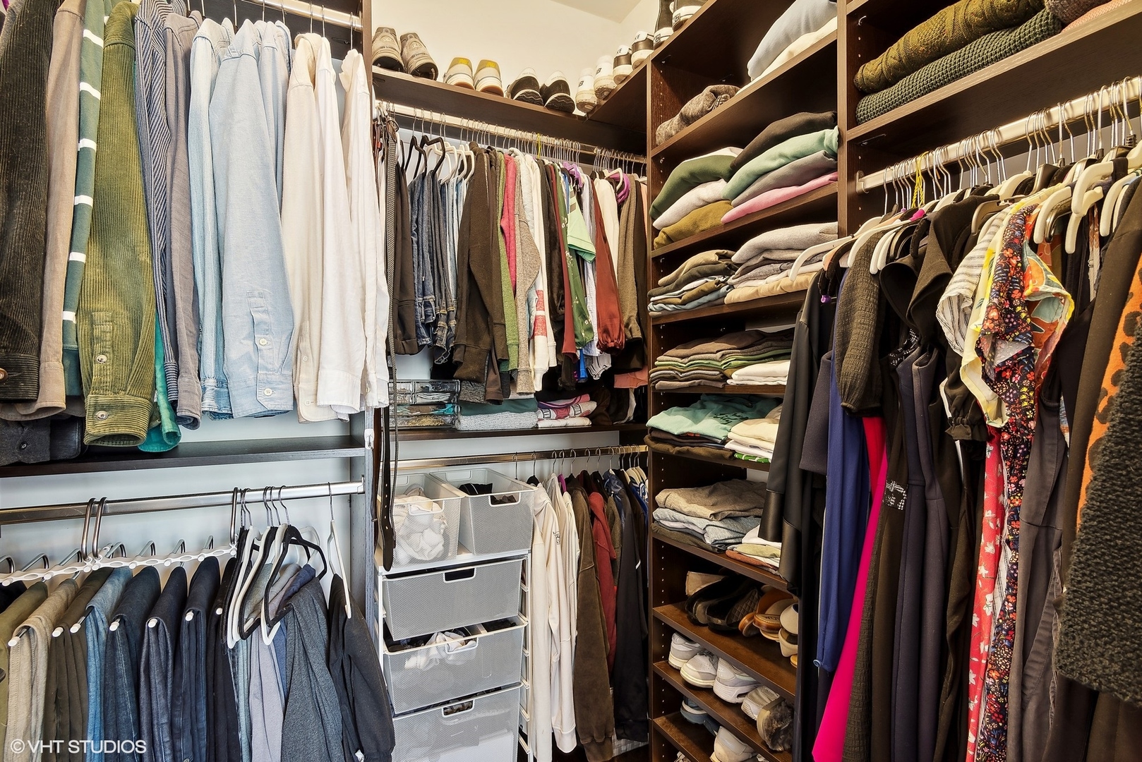2136 West North Avenue, Unit 2E Chicago, IL 60647 - Photo 18 of 22 a view of walk in closet with clothes and shoes
