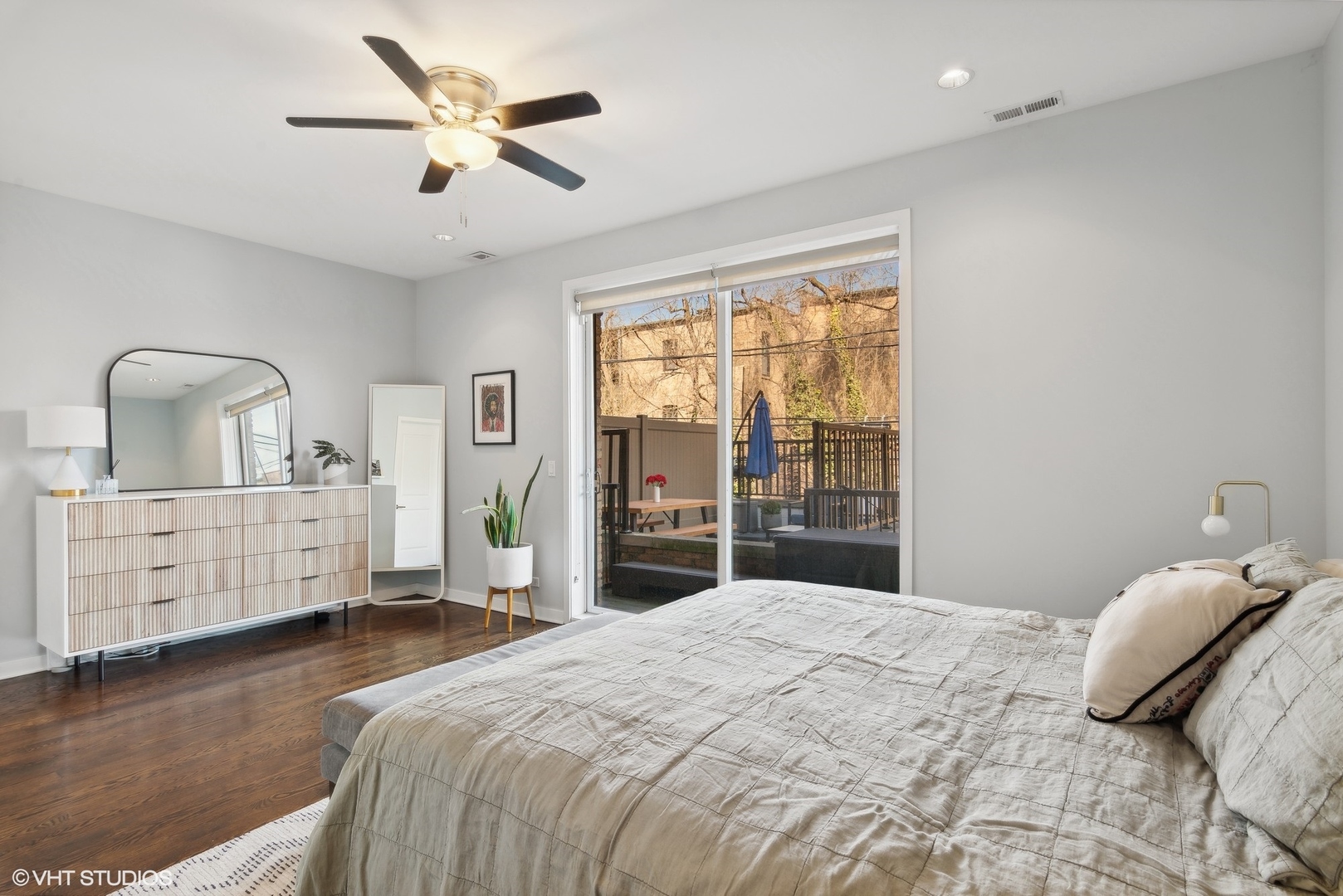 2136 West North Avenue, Unit 2E Chicago, IL 60647 - Photo 19 of 22 a bedroom with a large bed and a window
