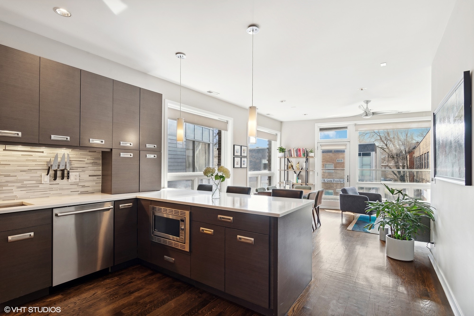 2136 West North Avenue, Unit 2E Chicago, IL 60647 - Photo 2 of 22 a large kitchen with a large counter top appliances and cabinets