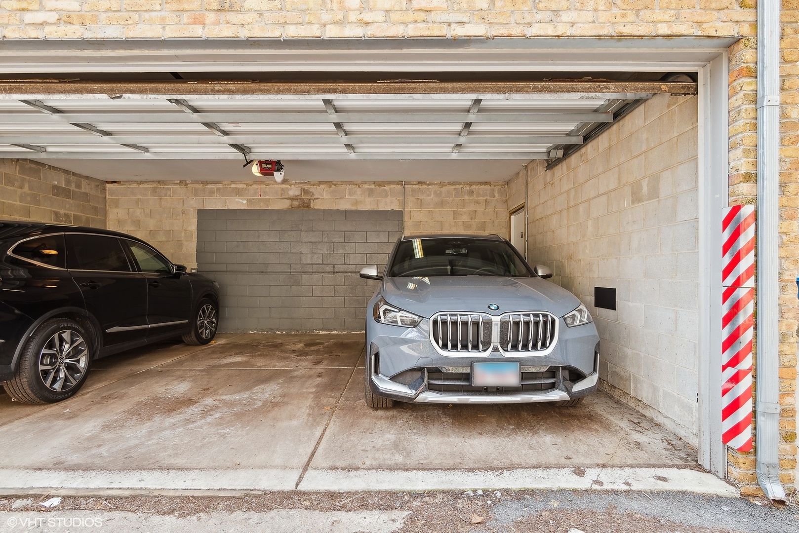 2136 West North Avenue, Unit 2E Chicago, IL 60647 - Photo 21 of 22 a view of car parked in garage