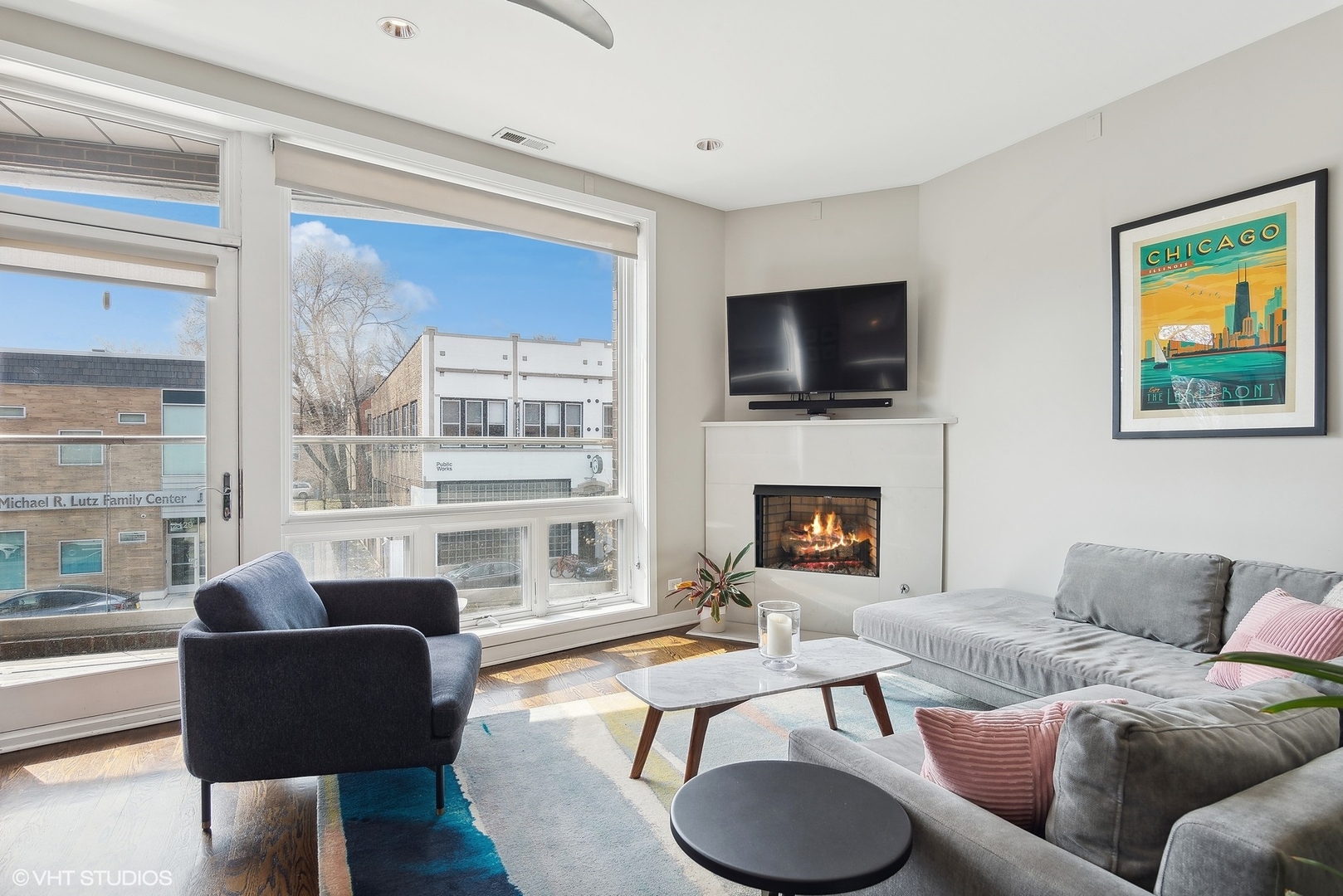 2136 West North Avenue, Unit 2E Chicago, IL 60647 - Photo 5 of 22 a living room with furniture fireplace and flat screen tv