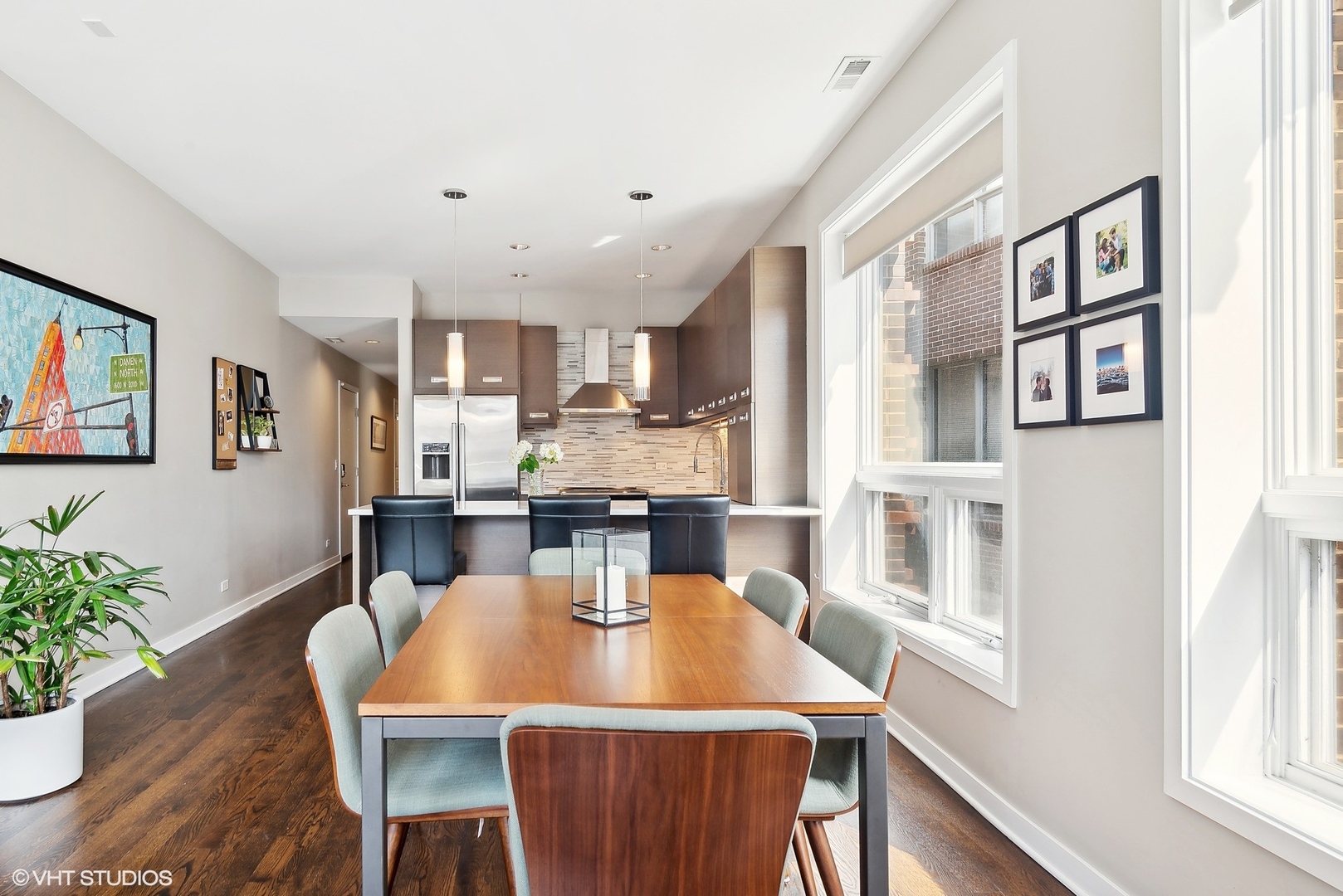 2136 West North Avenue, Unit 2E Chicago, IL 60647 - Photo 8 of 22 a view of a dining room with furniture and a potted plant