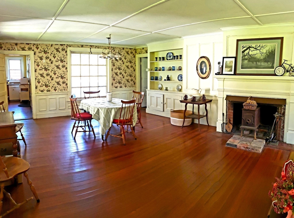 1 Searle Road Huntington, MA 01050 - Photo 14 of 42 a view of a dining room with furniture window and wooden floor