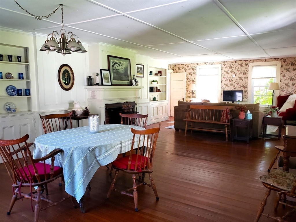 1 Searle Road Huntington, MA 01050 - Photo 15 of 42 a view of a dining room with furniture window and wooden floor