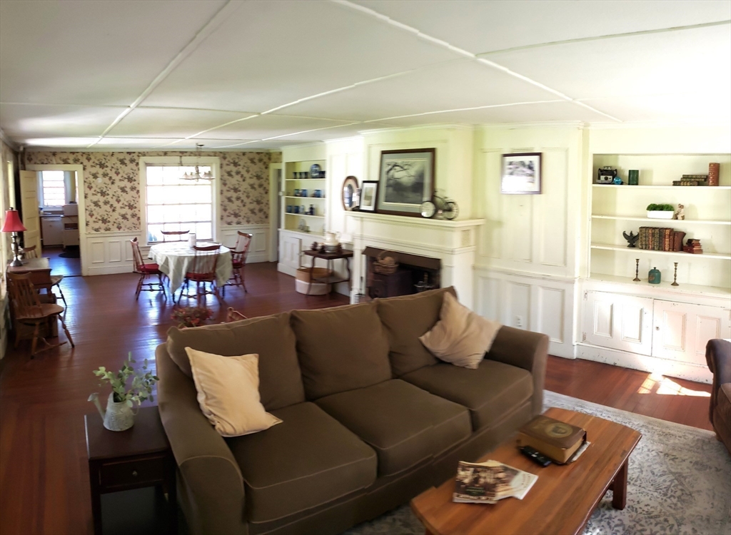 1 Searle Road Huntington, MA 01050 - Photo 17 of 42 a living room with furniture fireplace and a large window