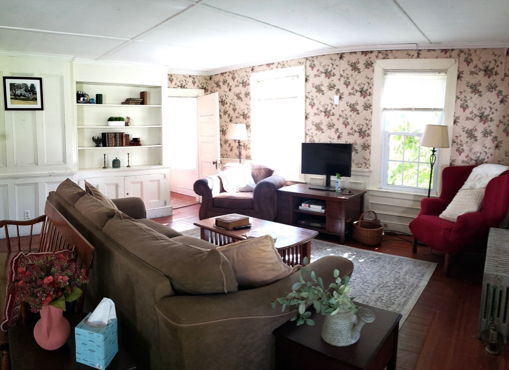 1 Searle Road Huntington, MA 01050 - Photo 20 of 42 a living room with furniture and a flat screen tv