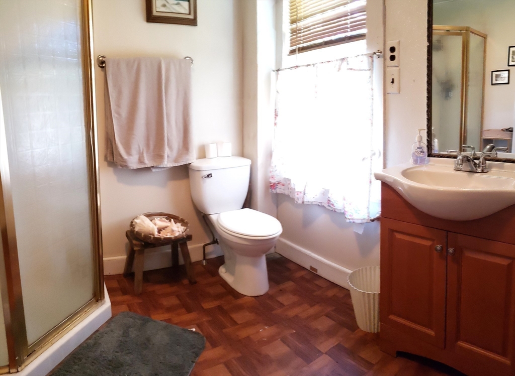 1 Searle Road Huntington, MA 01050 - Photo 27 of 42 a bathroom with a sink toilet and a mirror