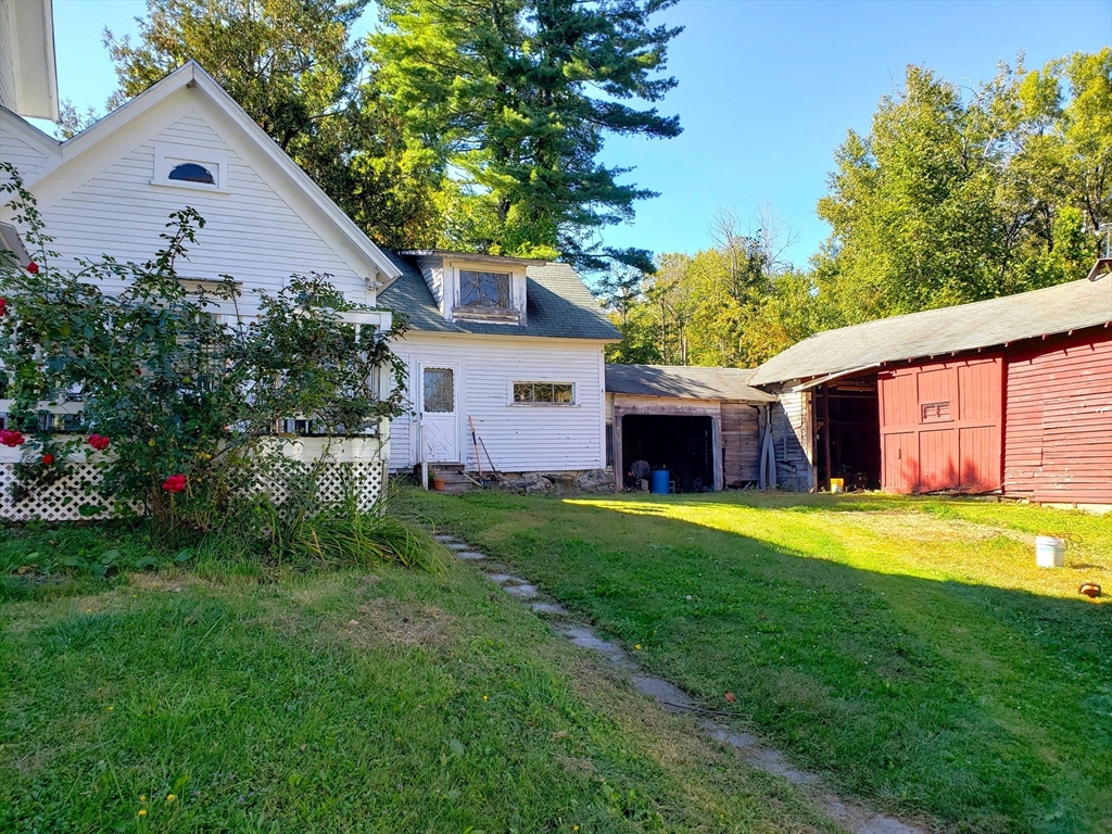 1 Searle Road Huntington, MA 01050 - Photo 5 of 42 a front view of house with yard and green space