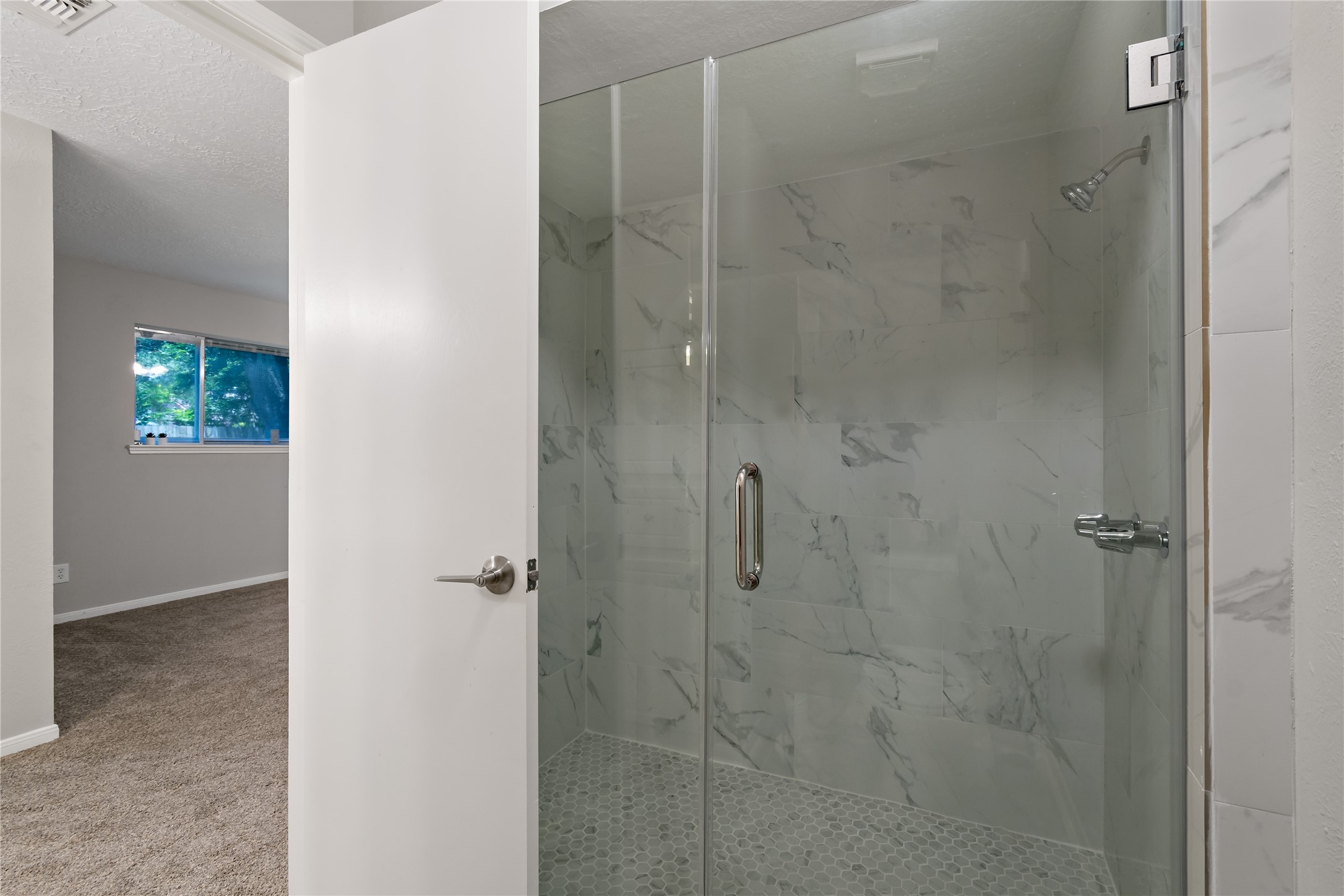 4302 Seneca Street Pasadena, TX 77504 - Photo 10 of 19 a bathroom with a shower