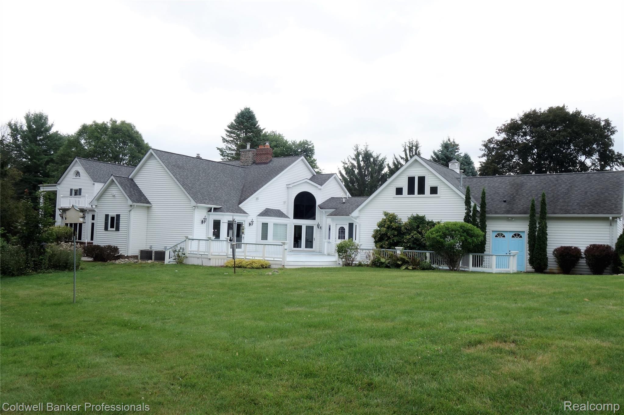 7755 Holcomb Road Clarkston, MI 48348 - Photo 27 of 51 Giant fenced grounds ideal for all your favorite outdoor games. Surrounded in an envelope of trees creating your own private oasis.