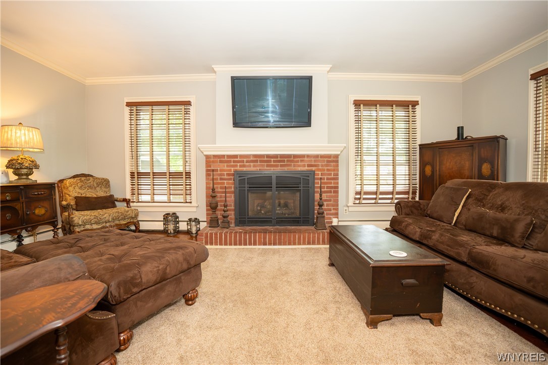 10775 Main Street Clarence, NY 14031 - Photo 19 of 50 living room gas fireplace