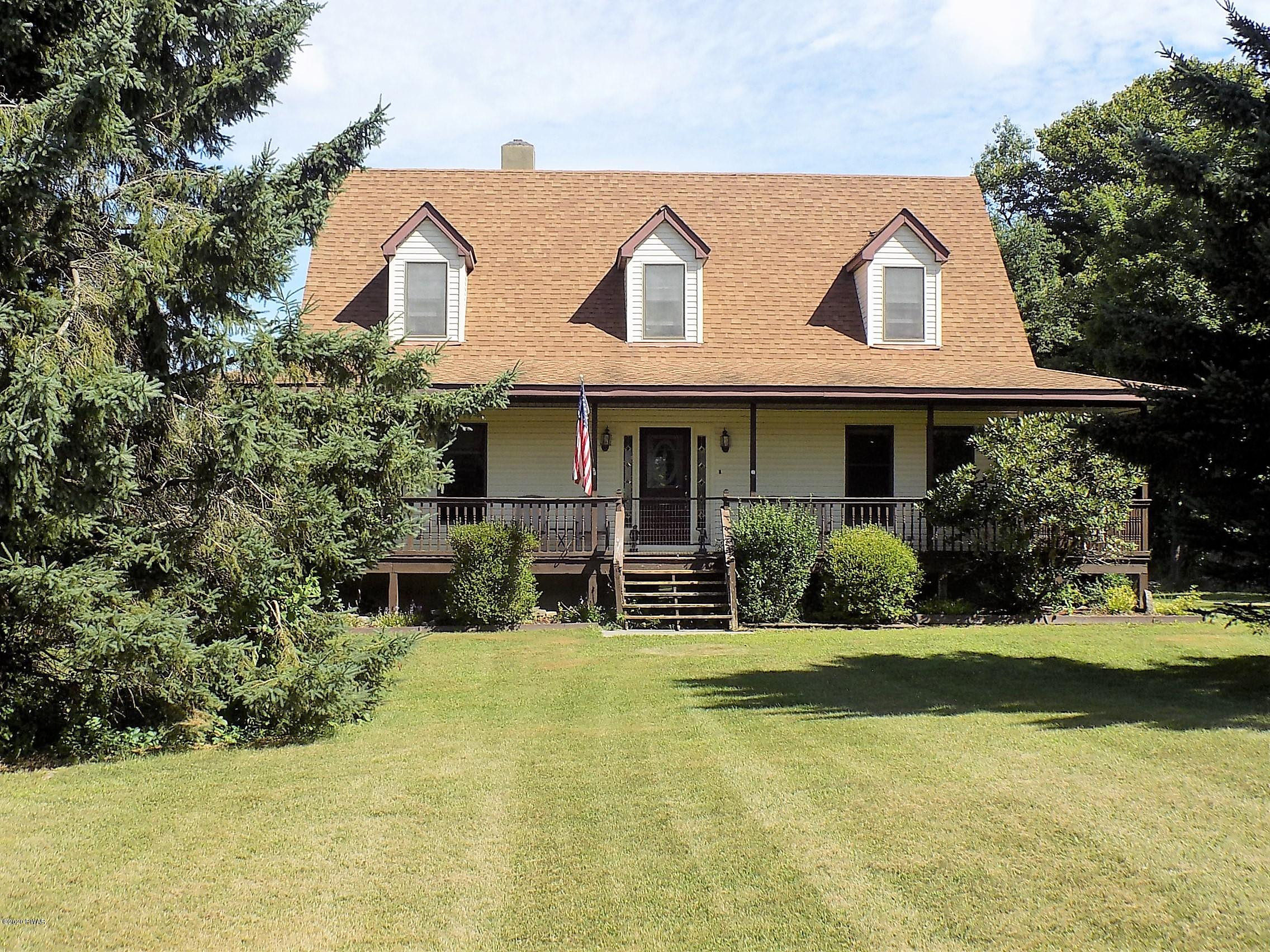 171 Valleyview Road Greentown, PA 18426 - Photo 2 of 111 a front view of a house with yard and green space