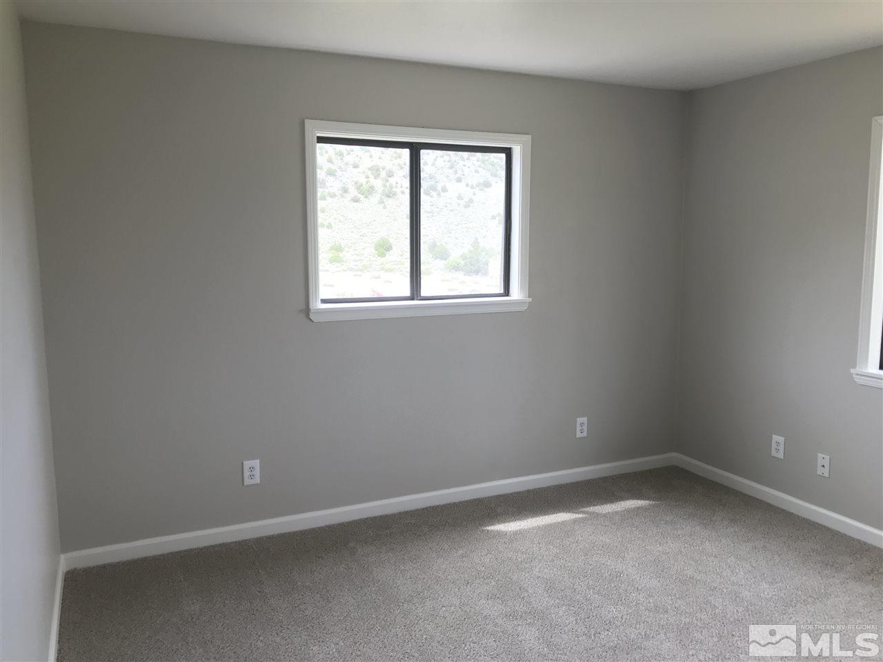 3200 Right Hand Canyon Road Reno, NV 89510 - Photo 5 of 21 an empty room with a window