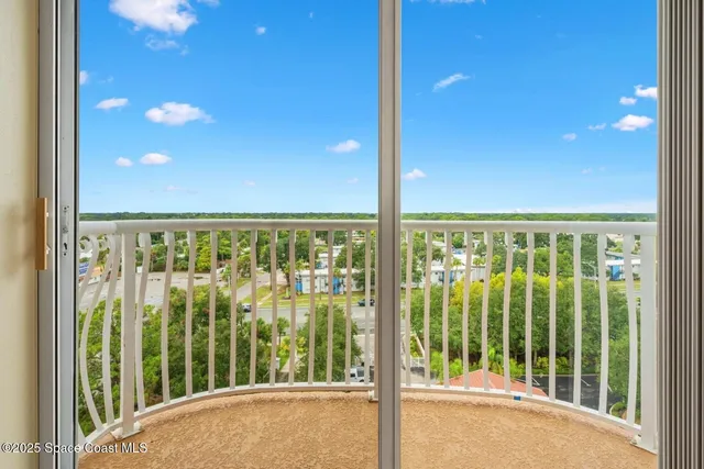 a view of a balcony with an outdoor space