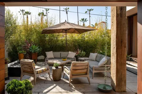 a view of swimming pool with lounge chair