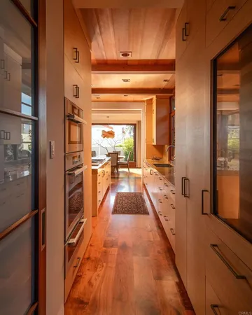a spacious bathroom with a granite countertop tub sink and mirror
