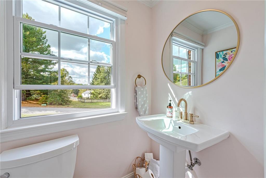 103 Lexington Drive Canonsburg, PA 15317 - Photo 15 of 44 a bathroom with a sink and a mirror